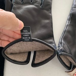 Black leather driving gloves